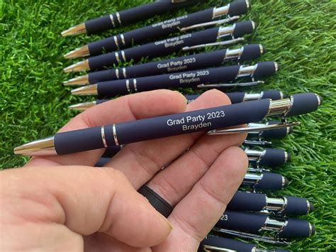 Custom branded navy promotional pens with personalized engraving