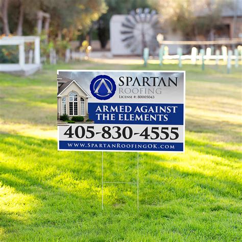 Large landscaping company yard sign in residential lawn